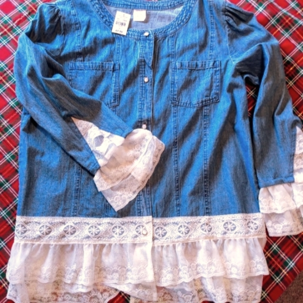 Women's large button up top. Light jean material.